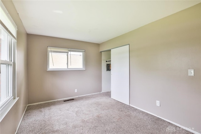 5565 Ehrling Rd, Cincinnati, OH 45227 - unfurnished bedroom with carpet, a closet, and baseboards