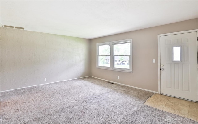 5565 Ehrling Rd, Cincinnati, OH 45227 - carpeted foyer entrance featuring baseboards
