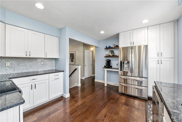 kitchen featuring stainless steel refrigerator with ice dispenser, dark wood-style floors, white cabinetry, and tasteful backsplash
