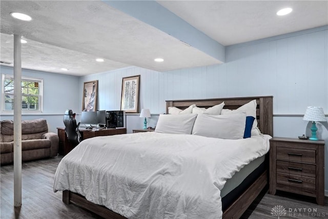 bedroom featuring recessed lighting and wood finished floors