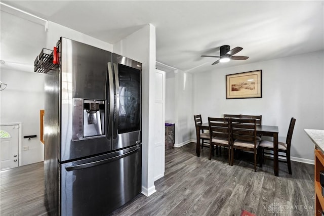 kitchen featuring stainless steel fridge with ice dispenser, ceiling fan, baseboards, and dark wood-type flooring