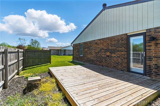 8398 Trowbridge Way, Huber Heights, OH 45424 - deck with a lawn and a fenced backyard