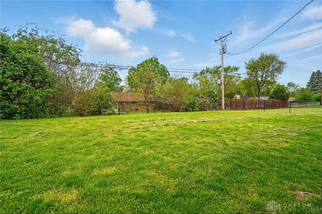 view of yard with fence
