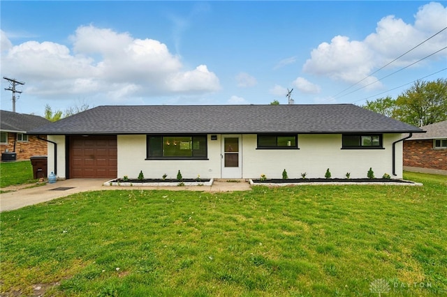 ranch-style house with roof with shingles, brick siding, a front lawn, concrete driveway, and an attached garage