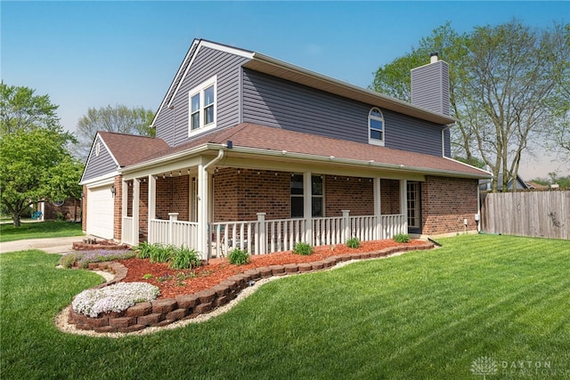 farmhouse-style home with fence, brick siding, a front yard, a chimney, and covered porch