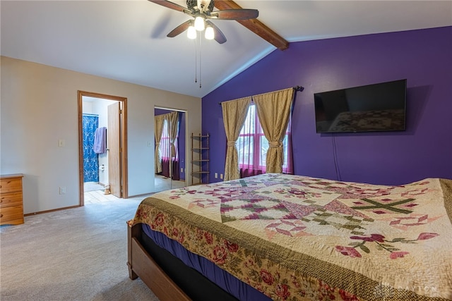 carpeted bedroom featuring baseboards, lofted ceiling with beams, and ceiling fan