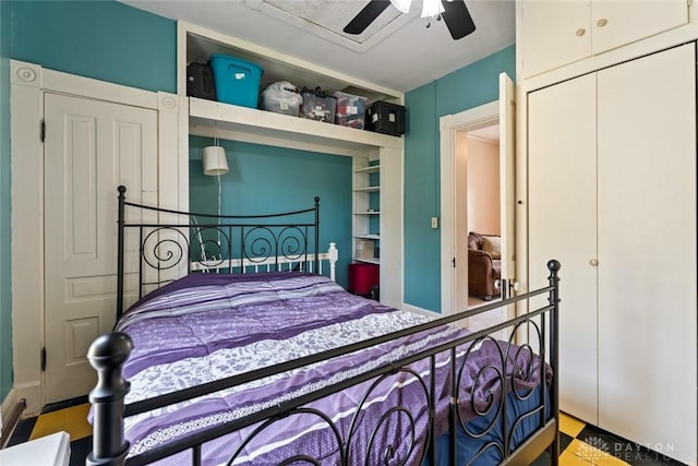 bedroom with a ceiling fan and a closet