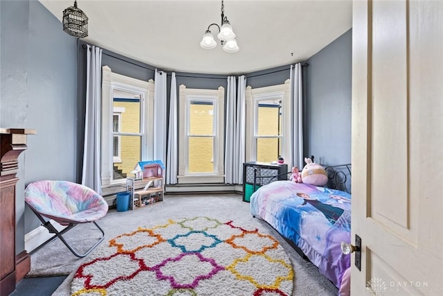 carpeted bedroom with a notable chandelier