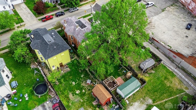 birds eye view of property with a residential view