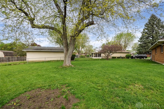 view of yard with fence