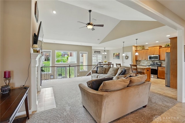 living area with ceiling fan, visible vents, high vaulted ceiling, recessed lighting, and light tile patterned flooring