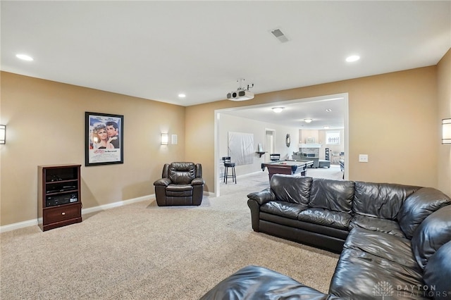 living room with visible vents, carpet flooring, baseboards, and recessed lighting