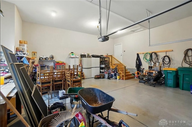 garage featuring a garage door opener
