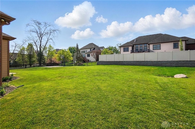 view of yard featuring fence