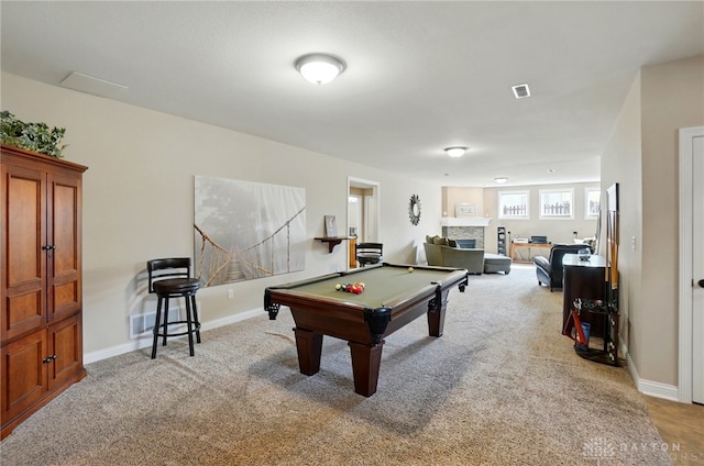rec room with baseboards, carpet flooring, billiards, and a fireplace
