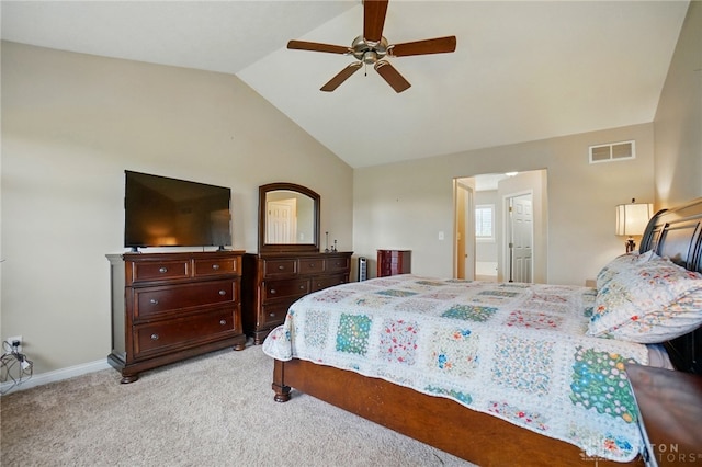 carpeted bedroom with visible vents, a ceiling fan, baseboards, and vaulted ceiling