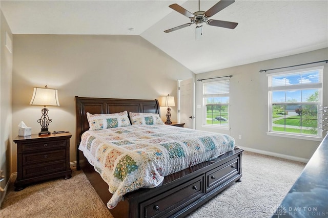 bedroom with baseboards, ceiling fan, lofted ceiling, and light carpet