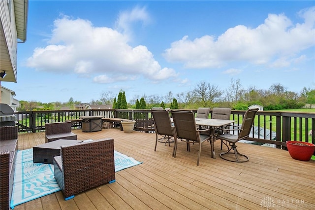deck with outdoor dining space