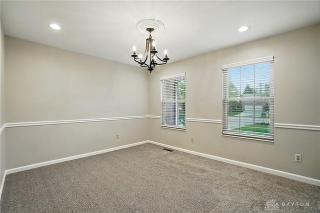 5497 Riverwalk Dr, Kings Mills, OH 45034 - carpeted empty room with a chandelier, baseboards, and recessed lighting