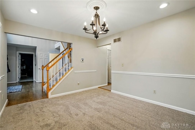 5497 Riverwalk Dr, Kings Mills, OH 45034 - carpeted spare room with stairs, baseboards, a chandelier, and recessed lighting