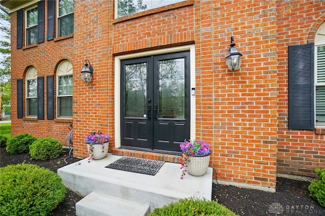 5497 Riverwalk Dr, Kings Mills, OH 45034 - property entrance featuring french doors and brick siding