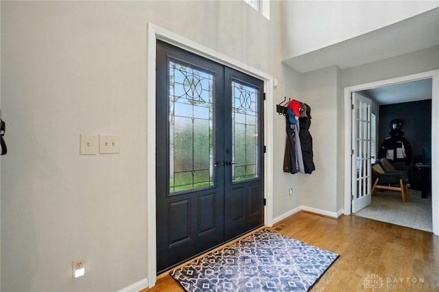 5497 Riverwalk Dr, Kings Mills, OH 45034 - foyer with french doors, plenty of natural light, and baseboards