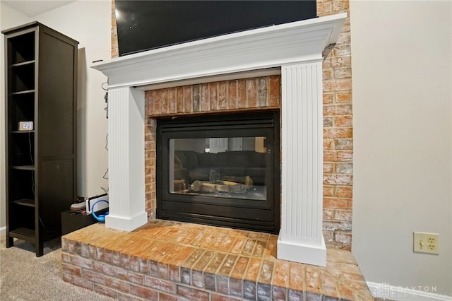 5497 Riverwalk Dr, Kings Mills, OH 45034 - detailed view of a fireplace and baseboards