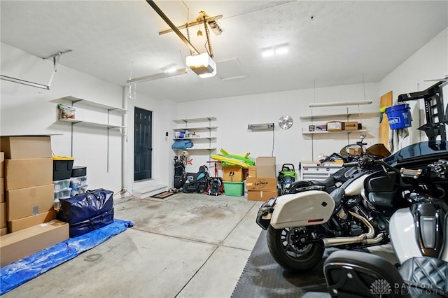 5497 Riverwalk Dr, Kings Mills, OH 45034 - garage with a garage door opener