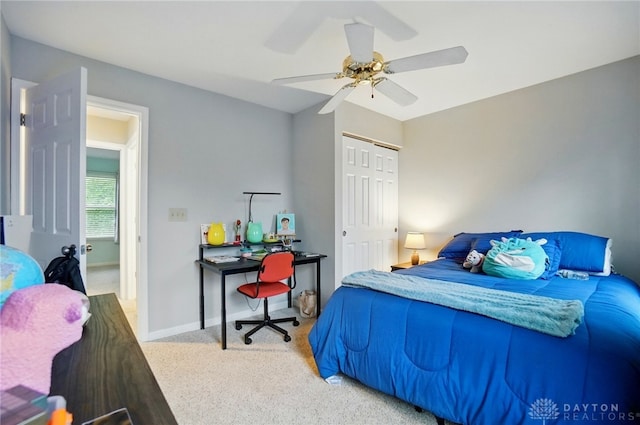 5497 Riverwalk Dr, Kings Mills, OH 45034 - bedroom featuring carpet, a closet, ceiling fan, and baseboards