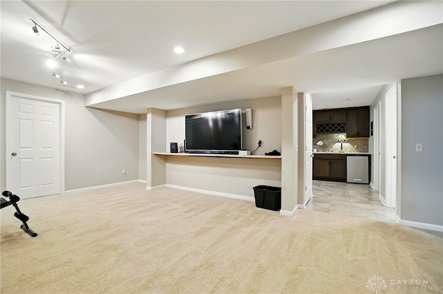 5497 Riverwalk Dr, Kings Mills, OH 45034 - unfurnished living room with light colored carpet, baseboards, recessed lighting, and rail lighting