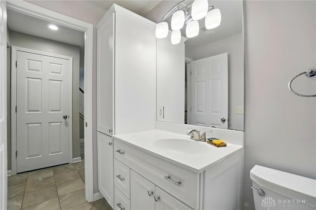 5497 Riverwalk Dr, Kings Mills, OH 45034 - bathroom featuring toilet, vanity, and recessed lighting