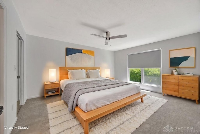 8464 Mcewen Rd, Washington Twp, OH 45458 - carpeted bedroom with baseboards and a ceiling fan