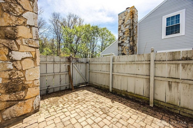 8464 Mcewen Rd, Washington Twp, OH 45458 - view of patio featuring a gate and fence