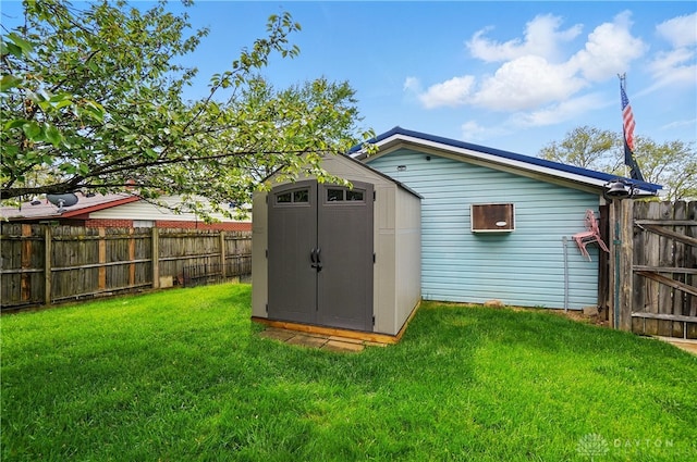 view of shed featuring a fenced backyard