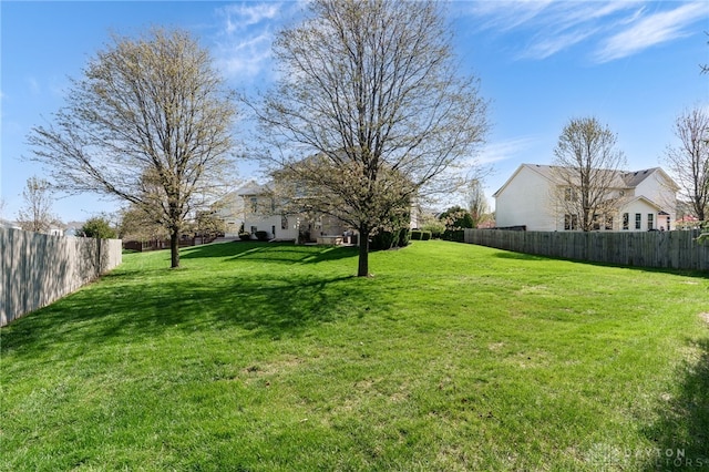 view of yard with fence