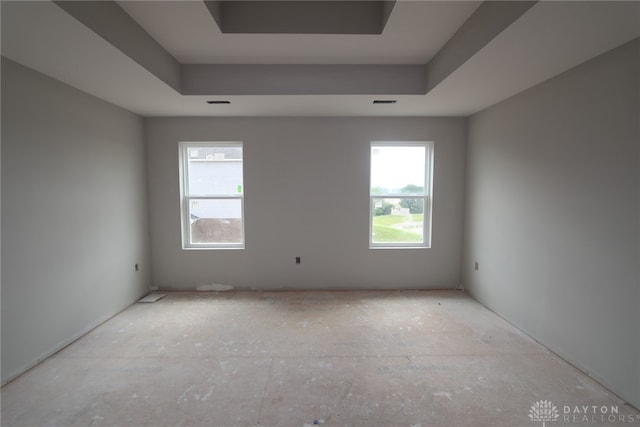 2878 Sky Crossing Dr Unit 80, Beavercreek, OH 45434 - spare room featuring healthy amount of natural light and a raised ceiling