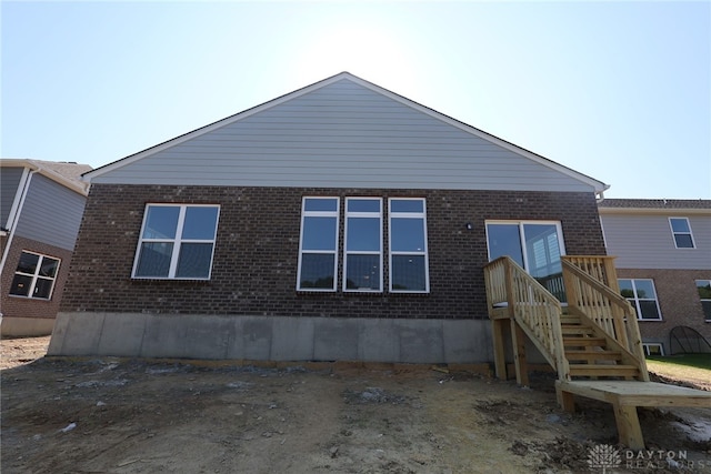 2885 Sky Crossing Dr Unit 56, Beavercreek, OH 45434 - back of property featuring brick siding