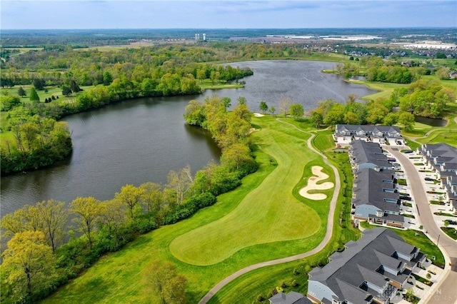 aerial view with a residential view, a water view, and golf course view