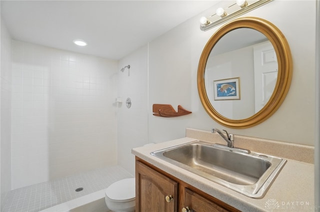 3637 N Section Ext, South Lebanon, OH 45065 - full bathroom with toilet, a tile shower, vanity, and recessed lighting
