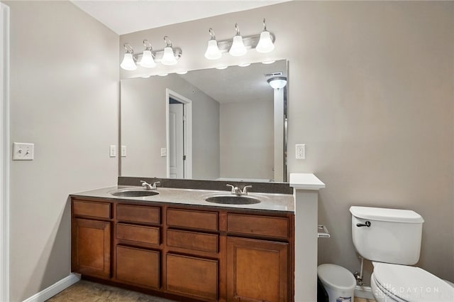 1304 Shadowood Trl, Maineville, OH 45039 - bathroom with toilet, visible vents, double vanity, and a sink