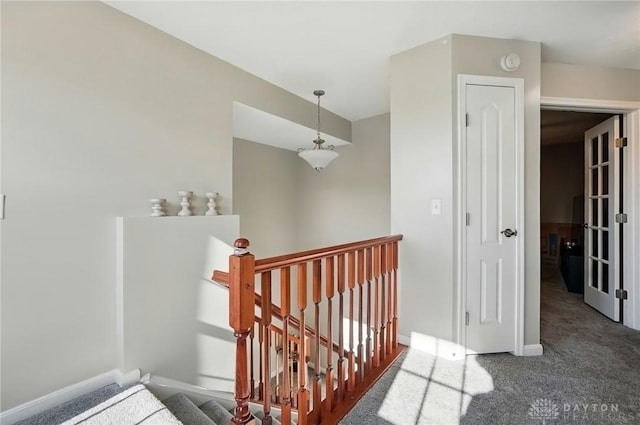 1304 Shadowood Trl, Maineville, OH 45039 - hallway featuring baseboards, an upstairs landing, and carpet floors