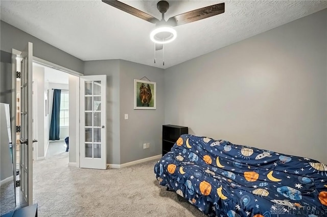 1304 Shadowood Trl, Maineville, OH 45039 - bedroom featuring carpet, baseboards, french doors, and a ceiling fan