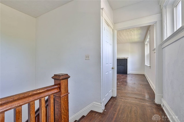 3733-3735 Reading Rd, Cincinnati, OH 45229 - hall featuring baseboards, an upstairs landing, and dark wood-type flooring