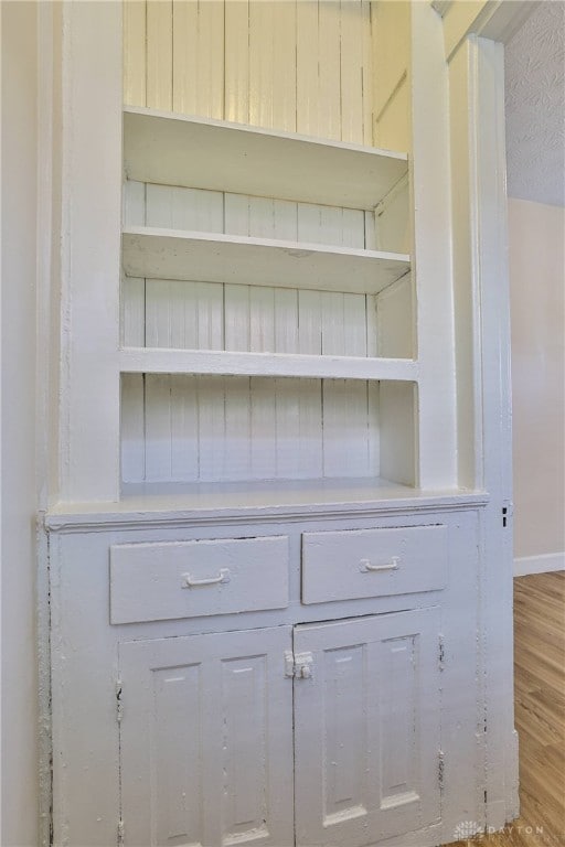 3733-3735 Reading Rd, Cincinnati, OH 45229 - details with baseboards and wood finished floors