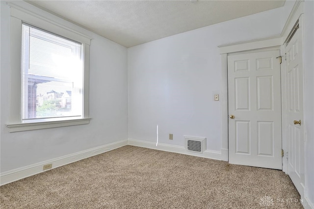 3733-3735 Reading Rd, Cincinnati, OH 45229 - spare room featuring carpet floors, baseboards, and visible vents