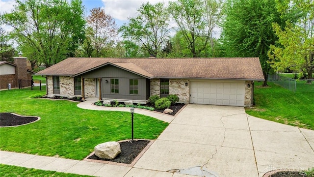 1330 E Centerville Station Rd, Dayton, OH 45459 - ranch-style home featuring driveway, a front yard, a garage, brick siding, and fence