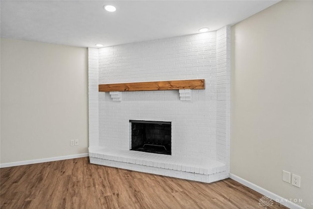 1330 E Centerville Station Rd, Dayton, OH 45459 - interior details with baseboards, recessed lighting, a brick fireplace, and wood finished floors