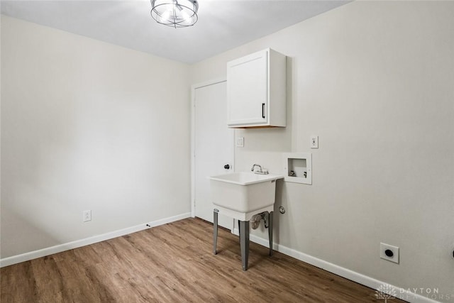 1330 E Centerville Station Rd, Dayton, OH 45459 - washroom featuring laundry area, wood finished floors, baseboards, hookup for a washing machine, and hookup for an electric dryer