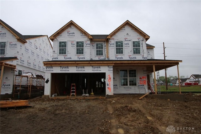 2014 Glen Valley Dr Unit 218, Washington Twp, OH 45458 - unfinished property with a garage and dirt driveway