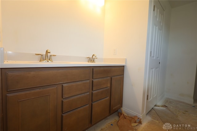 2014 Glen Valley Dr Unit 218, Washington Twp, OH 45458 - bathroom with baseboards and double vanity